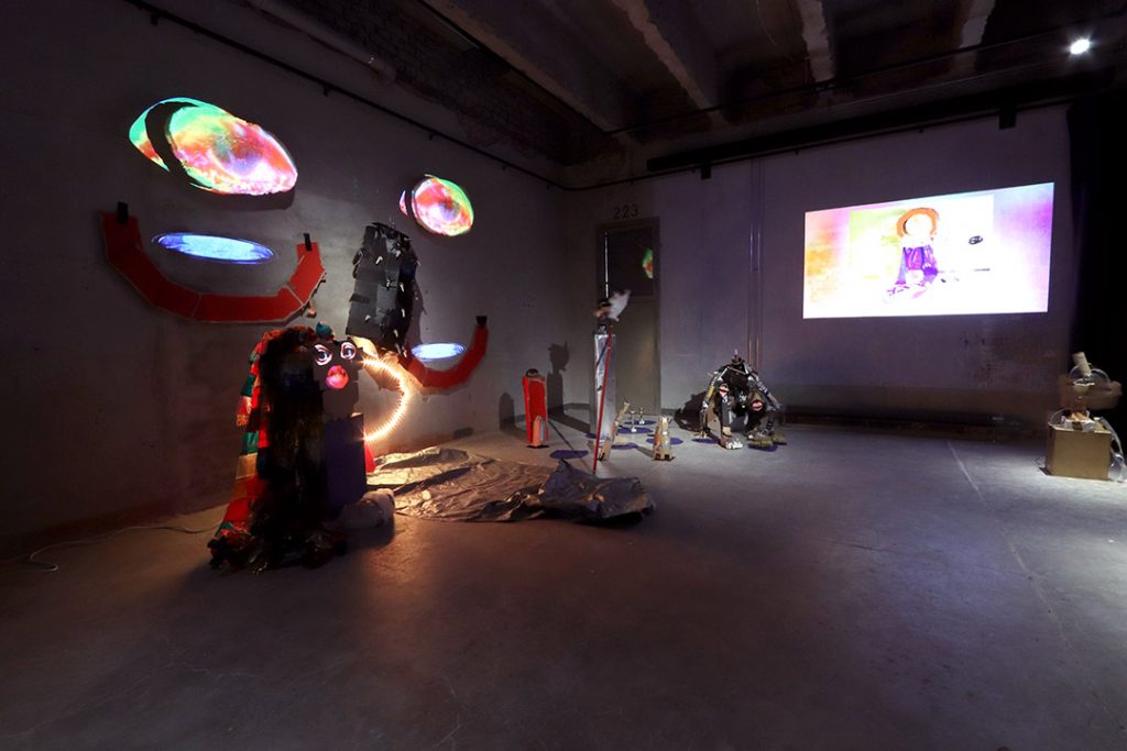 Art works made of recycled materials and a video projection