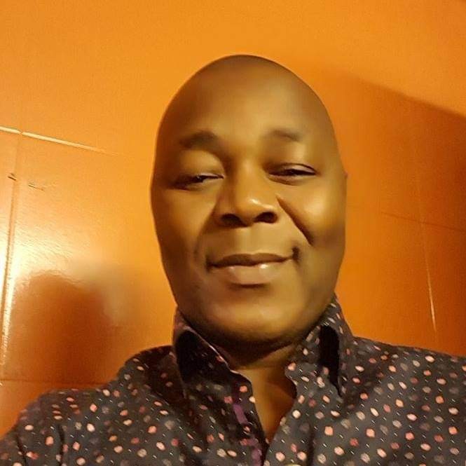 selfie portrait of a man smiling